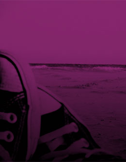 Converse on beach, purple
